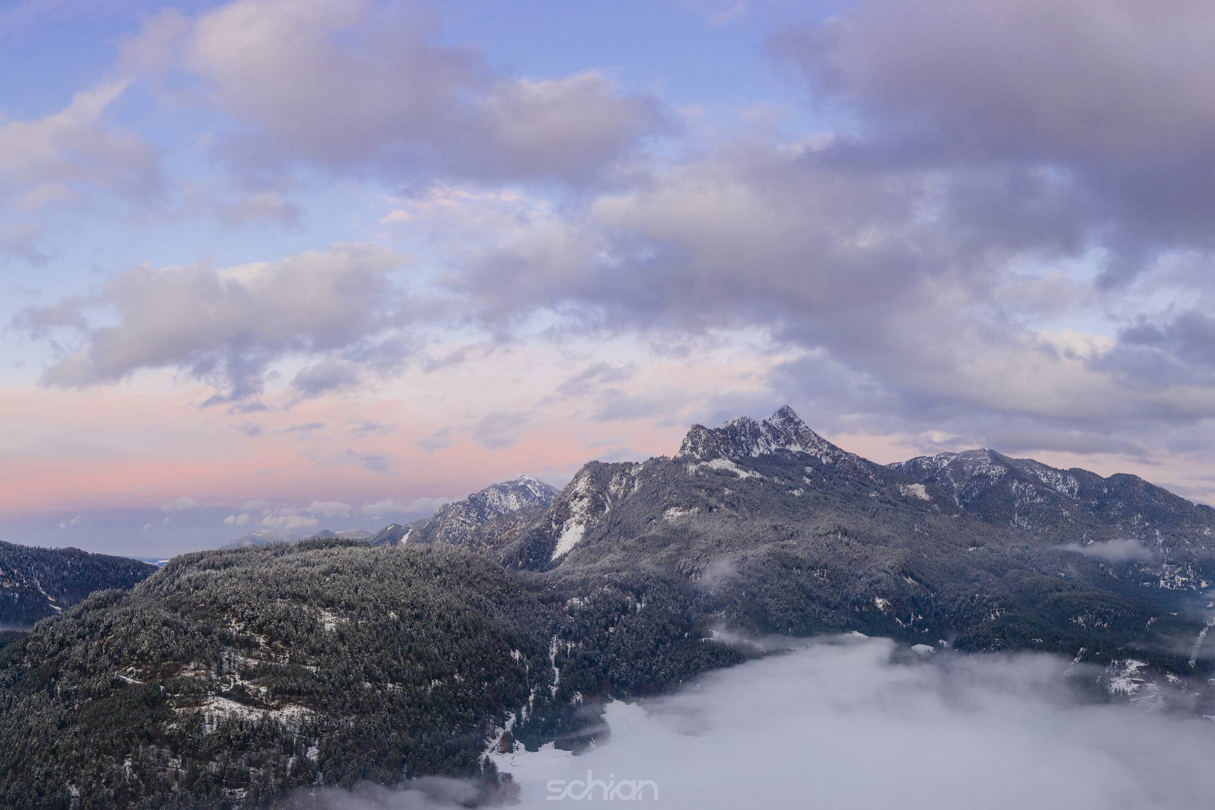 alps mountain saeuling in reutte pflach on sunset with colorful cloud sky at fall